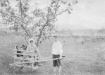 1915 Harold and Peg in the&nbsp;orchard