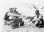 Lynn Kirk; Archibald Beatty and Pip Powell picnicking on beach on trip to Marlo, Victoria, c. 1923