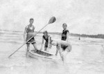 Harold Beatty and Peggy Beatty with paddle boat on the beach at Mentone, Victoria, c. 1925